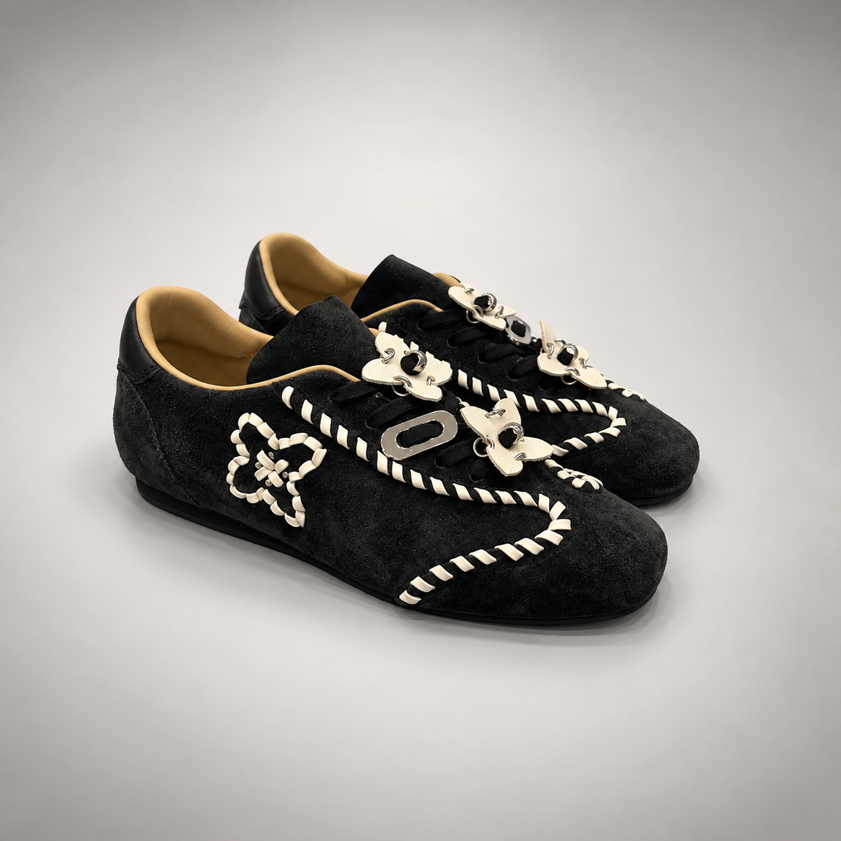 Black cream whipstitch sneakers 1