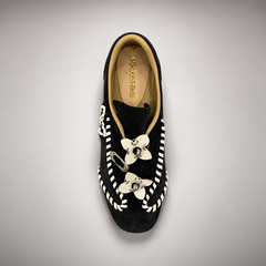 Black cream whipstitch sneakers 6
