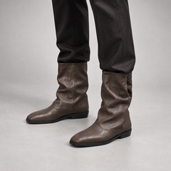 Dark taupe draped leather fold-over mid-calf boots - on foot