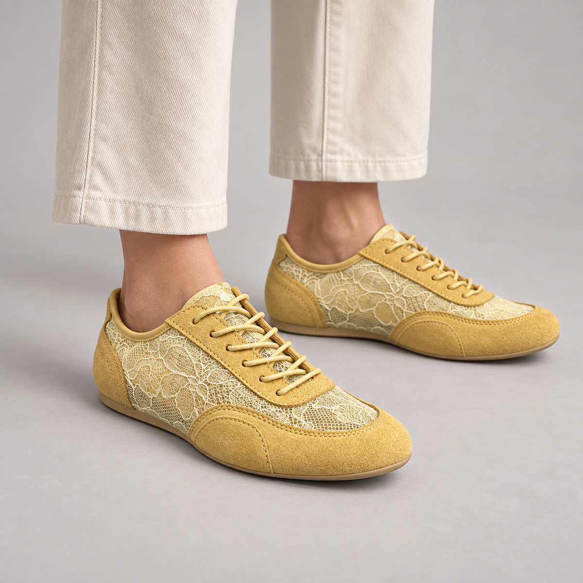 Mustard yellow floral mesh suede sneakers - on foot