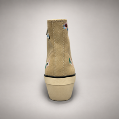 Beige floral embroidered canvas wedge sneaker