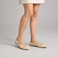 Beige buckle-strap suede flats, on-foot view