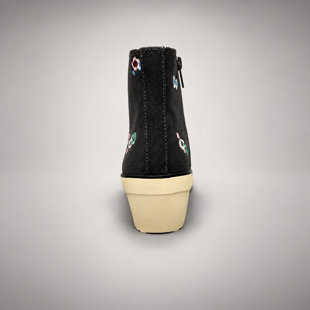 Black floral embroidered canvas wedge sneaker