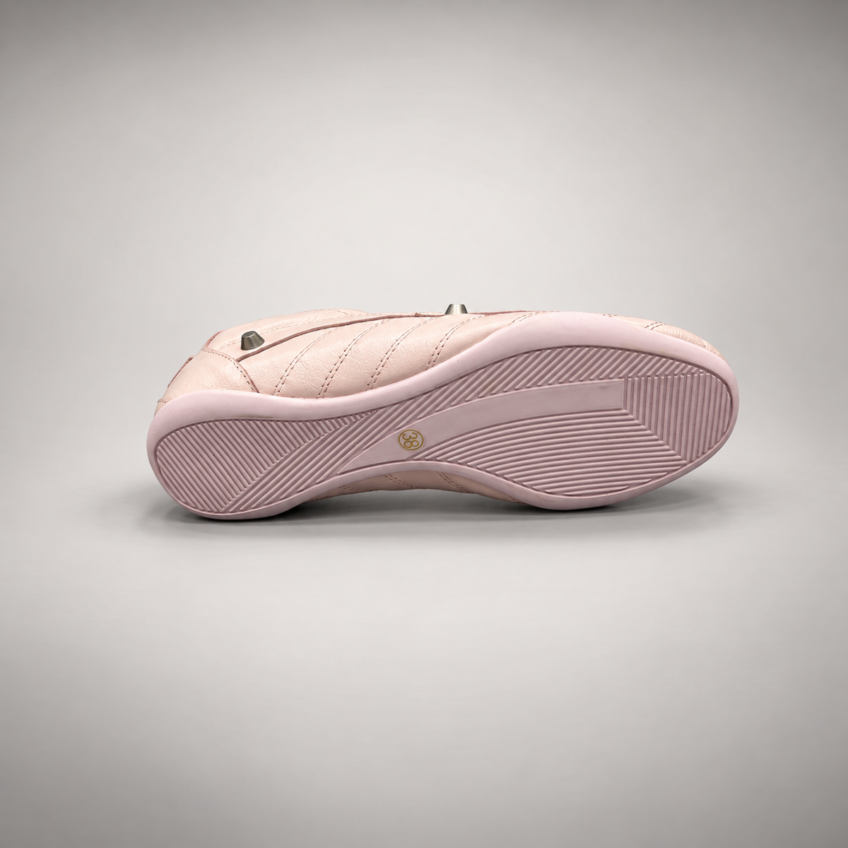 Blush pink studded leather sneaker