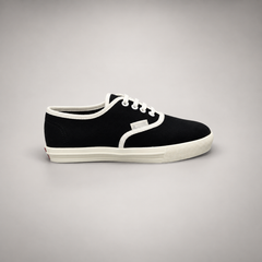 Black canvas lace-up sneakers, side view