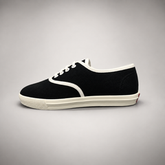 Black canvas lace-up sneakers, detail view
