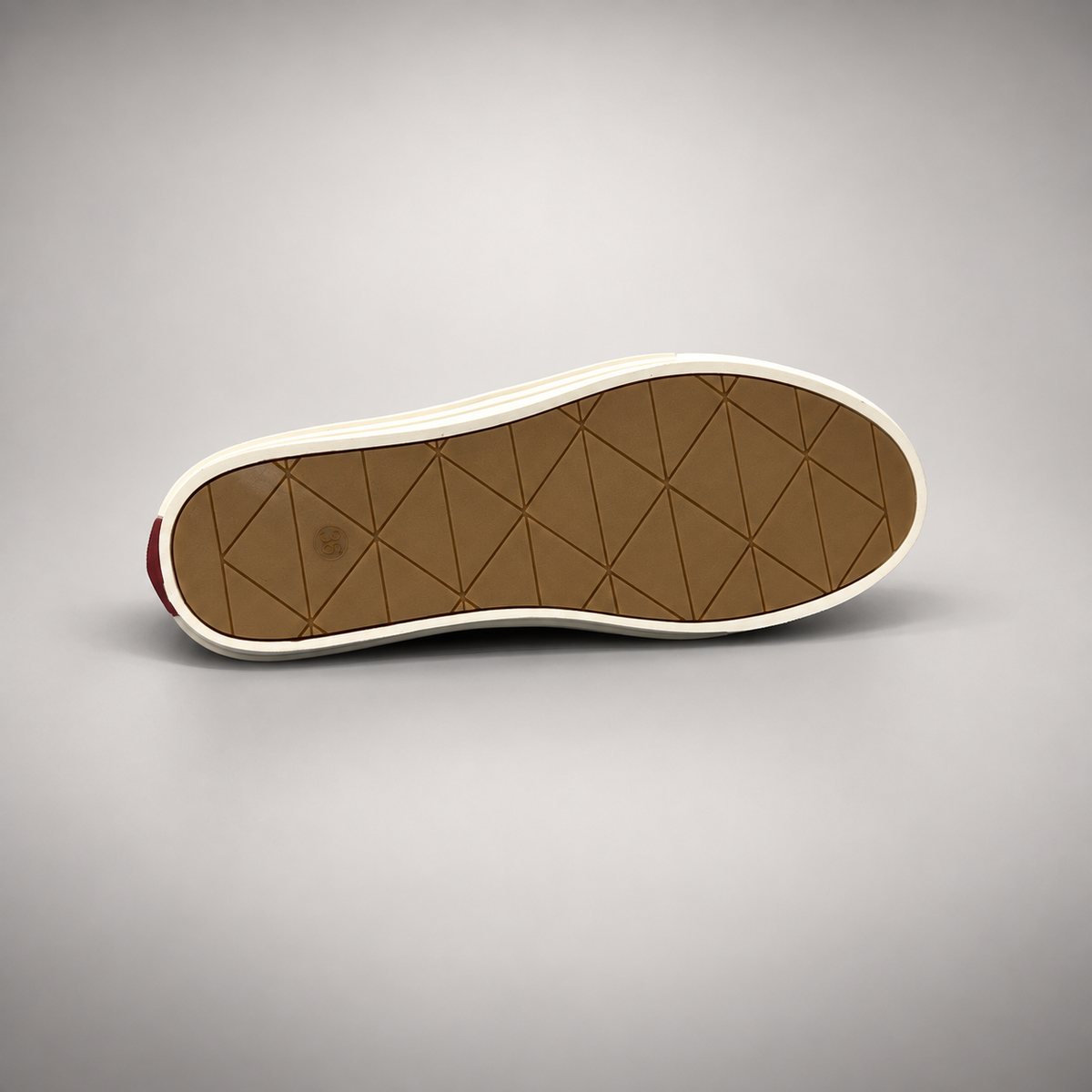 Black canvas lace-up sneakers, sole view