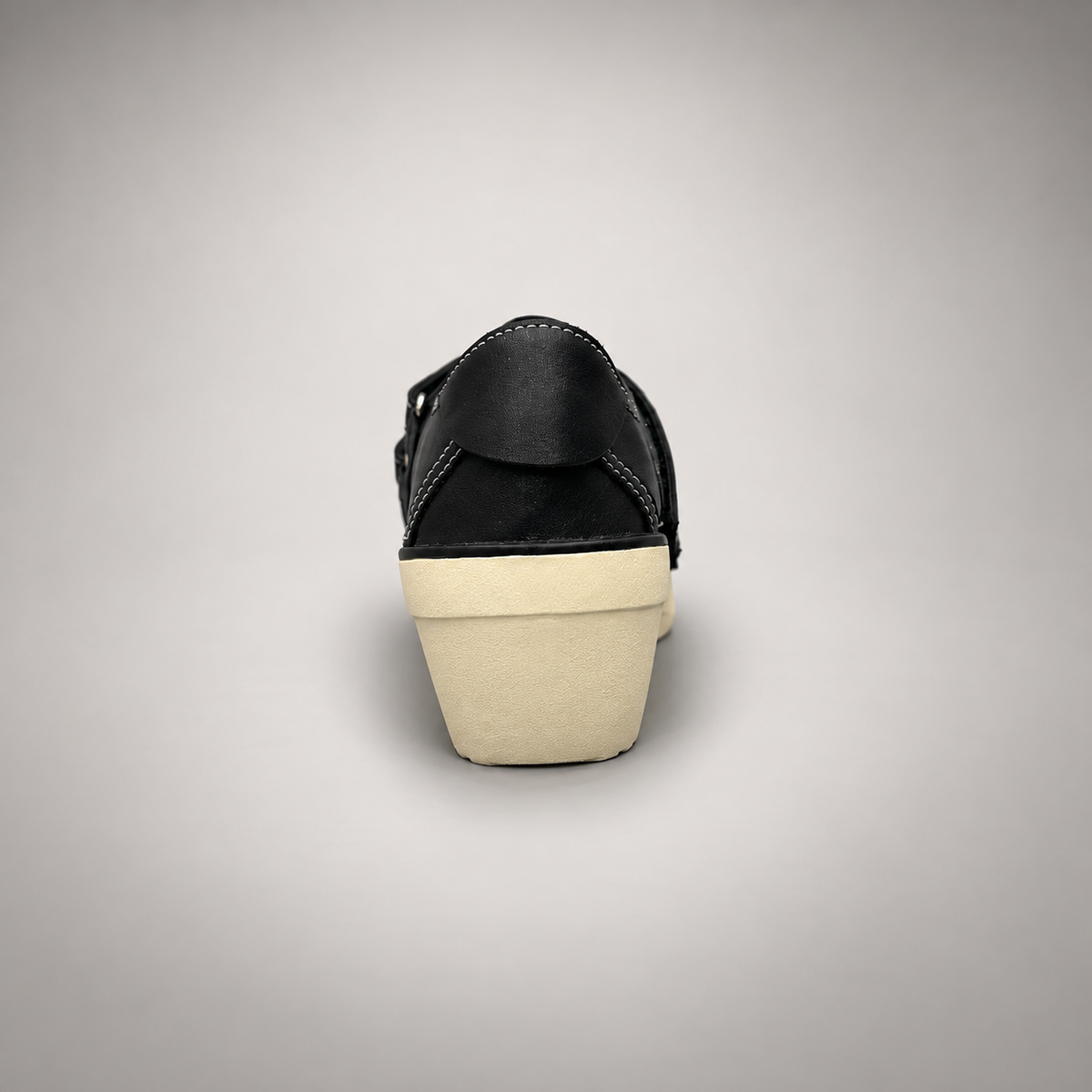 Black triple-strap wedge sneakers, back view