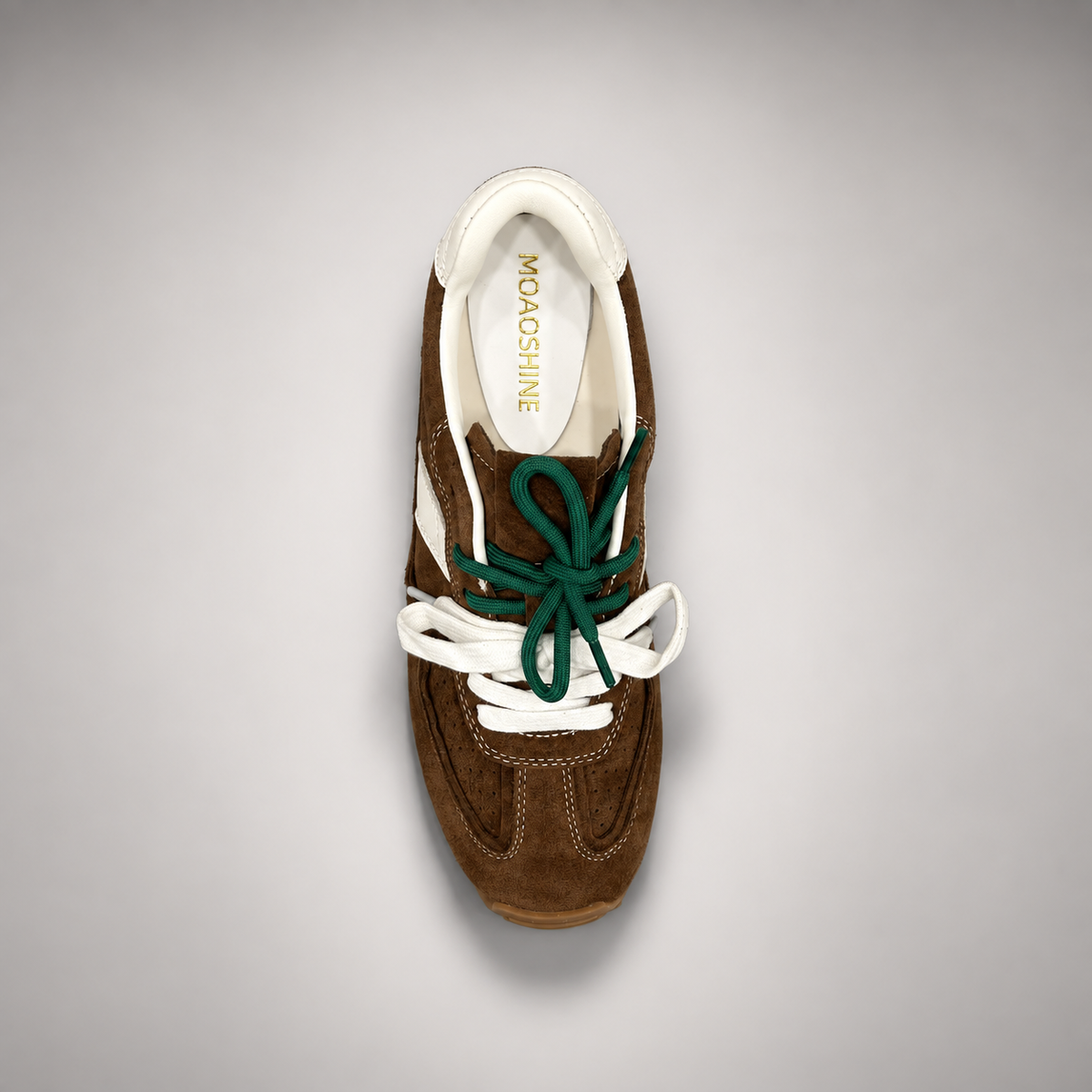 Dark brown suede sneakers, detail view