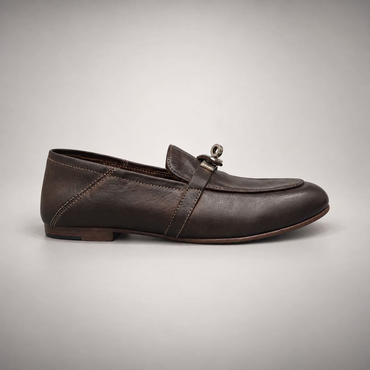 Dark brown washed leather horsebit loafer side view