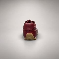 Burgundy low-top lace-up sneaker rear view
