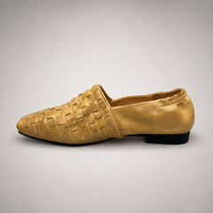 Gold woven loafer opposite side profile showing a woven slip-on upper