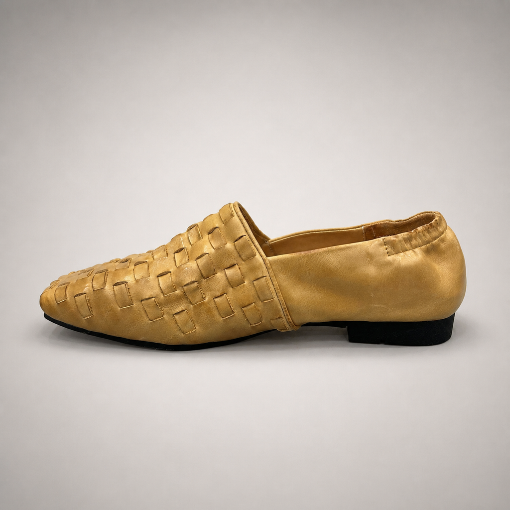 Gold woven loafer opposite side profile showing a woven slip-on upper