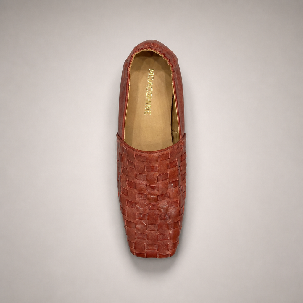 Rust woven loafer outsole view showing the cow leather outsole