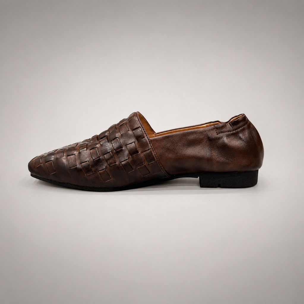 Brown woven loafer opposite side profile showing a woven slip-on upper