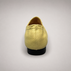 Yellow woven loafer outsole view showing the cow leather outsole