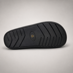 Black lace-up shoe outsole view showing the rubber outsole