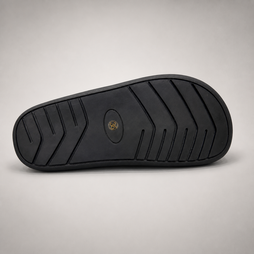 Black lace-up shoe outsole view showing the rubber outsole