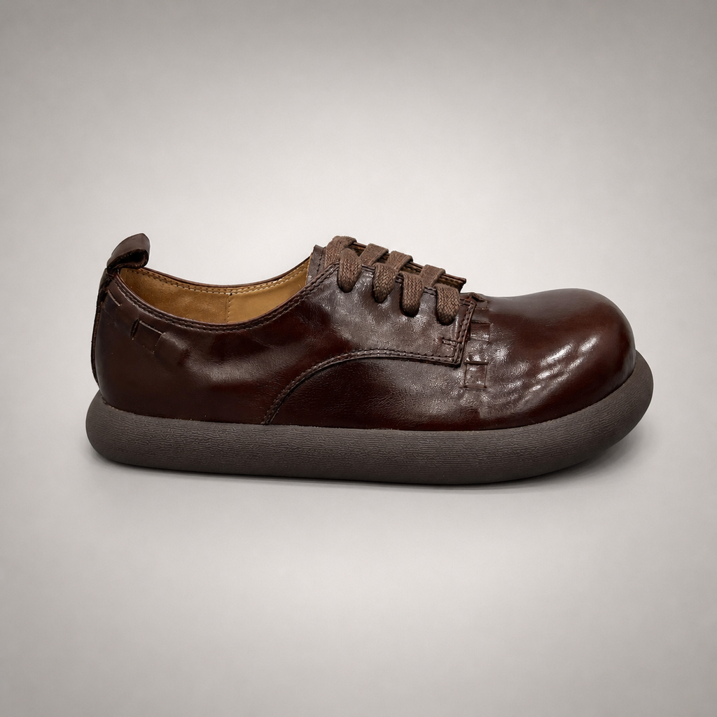 Brown lace-up shoe second pair angle showing a lace-up construction