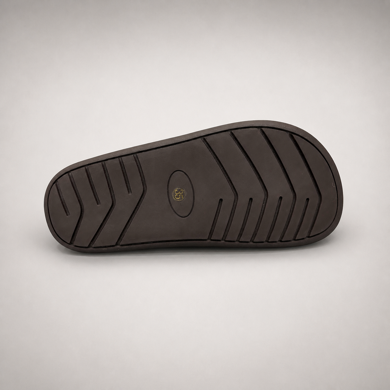 Brown lace-up shoe top view showing a lace-up construction