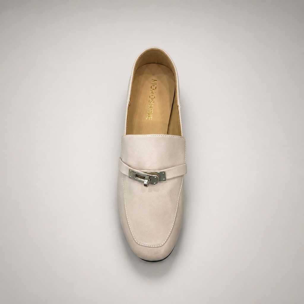 Ivory loafer top view showing a metal accent across the vamp