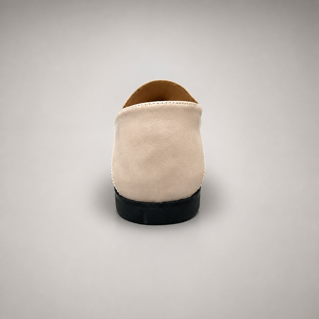 Ivory loafer rear view showing a metal accent across the vamp