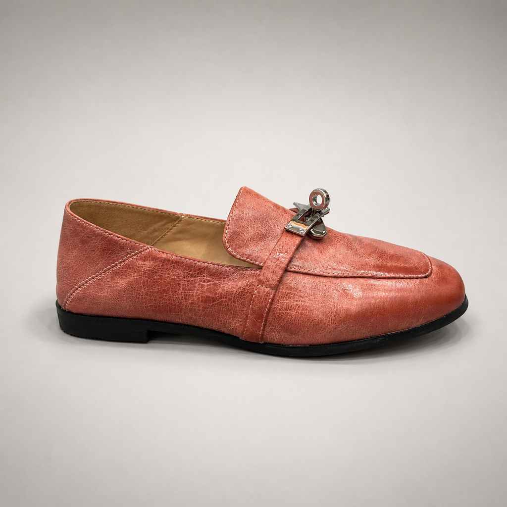 Rust loafer second pair angle showing a metal accent across the vamp