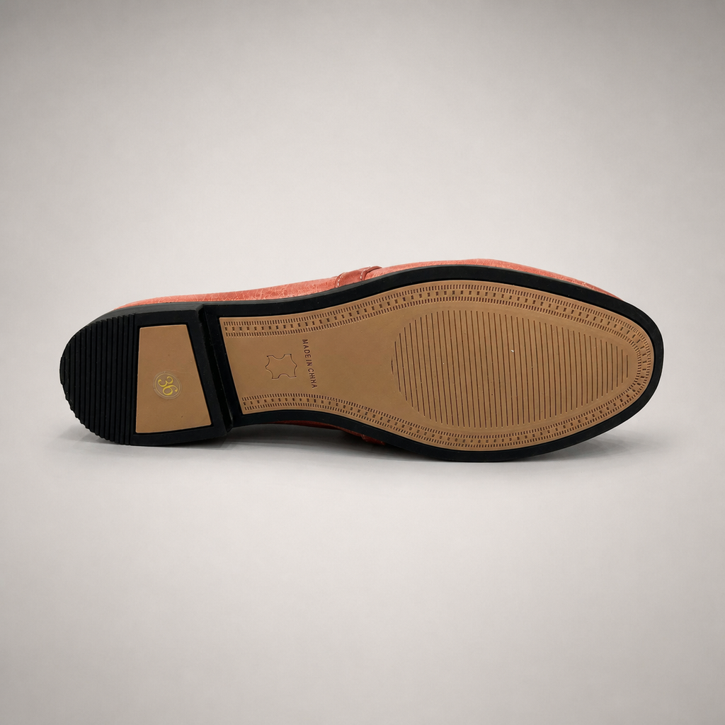 Rust loafer outsole view showing the cow leather outsole