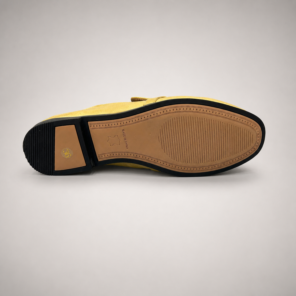 Yellow loafer outsole view showing the cow leather outsole