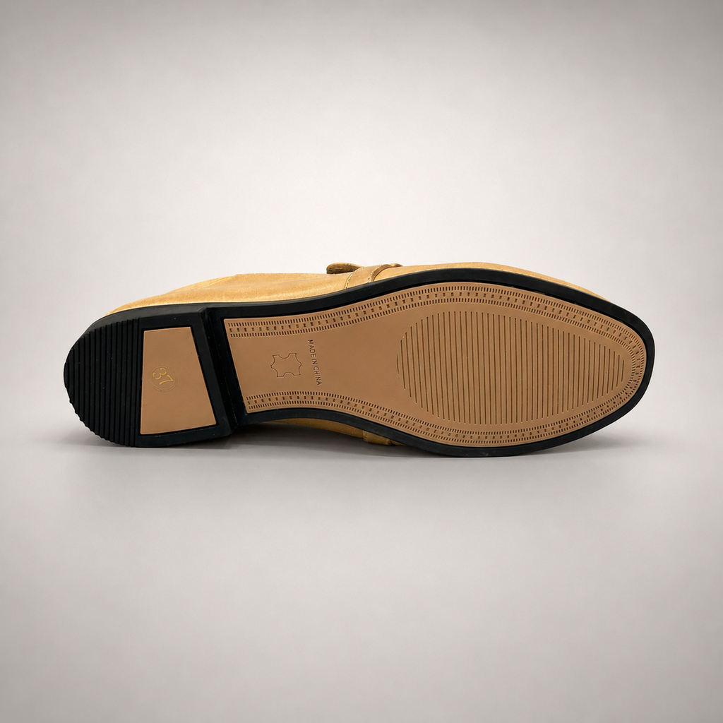 Tan loafer outsole view showing the cow leather outsole