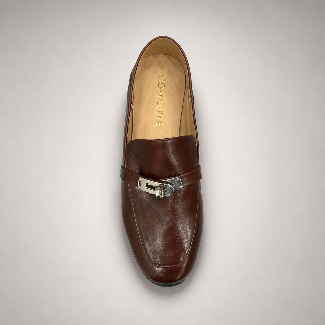 Brown loafer outsole view showing the cow leather outsole