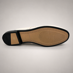 Ivory mule loafer outsole view showing the cow leather outsole