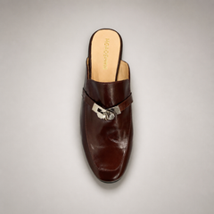 Brown mule loafer outsole view showing the cow leather outsole