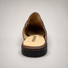 Brown mule loafer top view showing an open-back mule construction and metal vamp accent