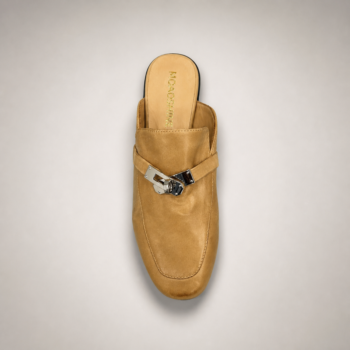 Tan mule loafer outsole view showing the cow leather outsole