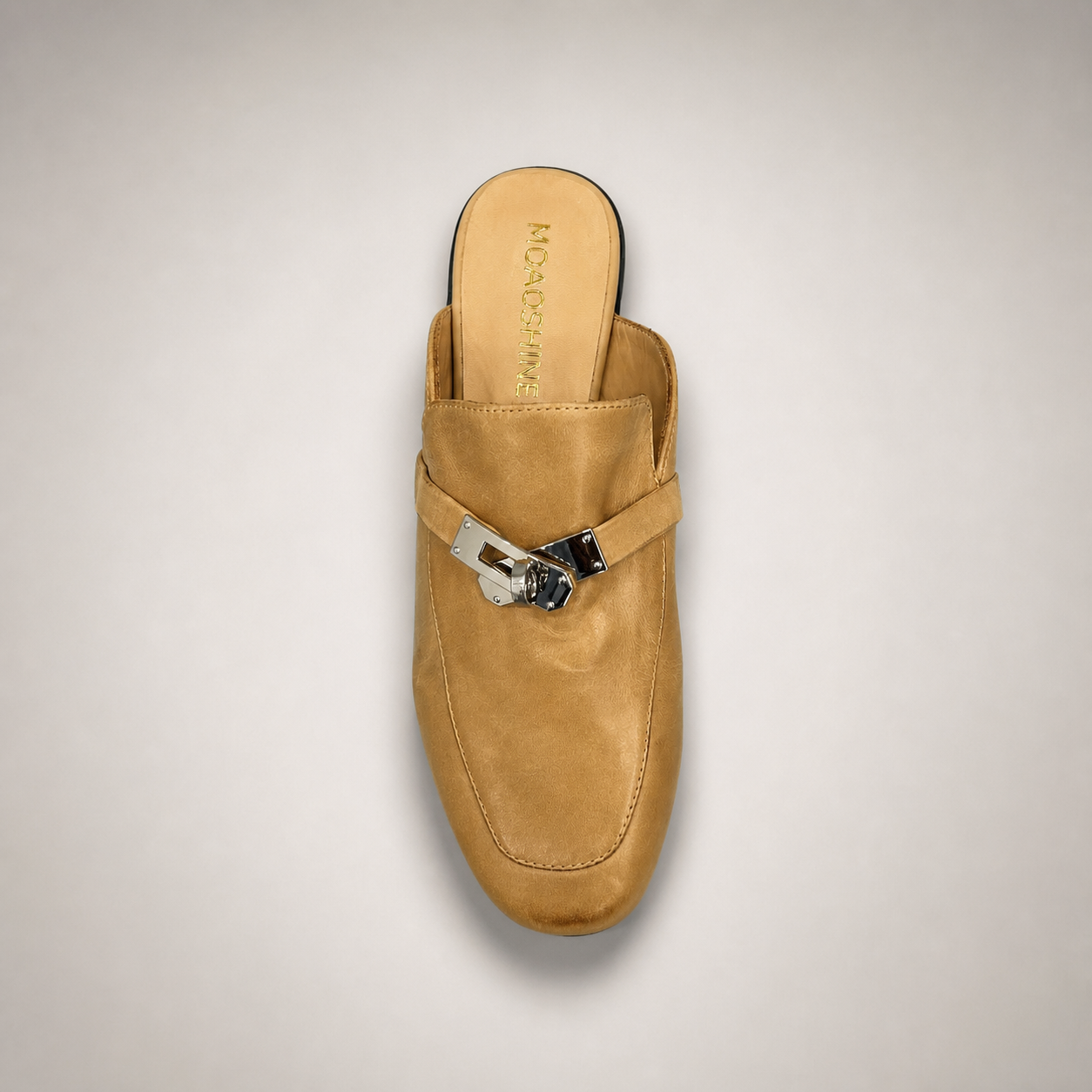 Tan mule loafer outsole view showing the cow leather outsole