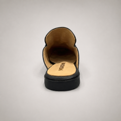 Black mule loafer top view showing an open-back mule construction and metal vamp accent
