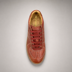 Rust platform sneaker top view showing a lace-up upper and raised platform sole