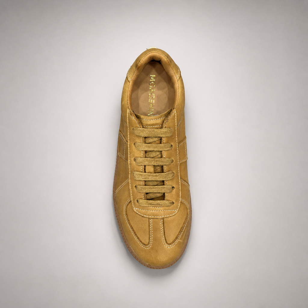 Tan platform sneaker outsole view showing the rubber outsole