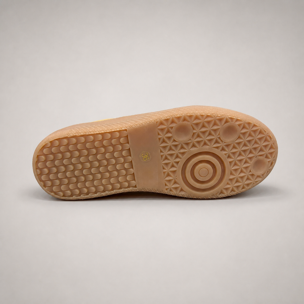 Tan platform sneaker top view showing a lace-up upper and raised platform sole