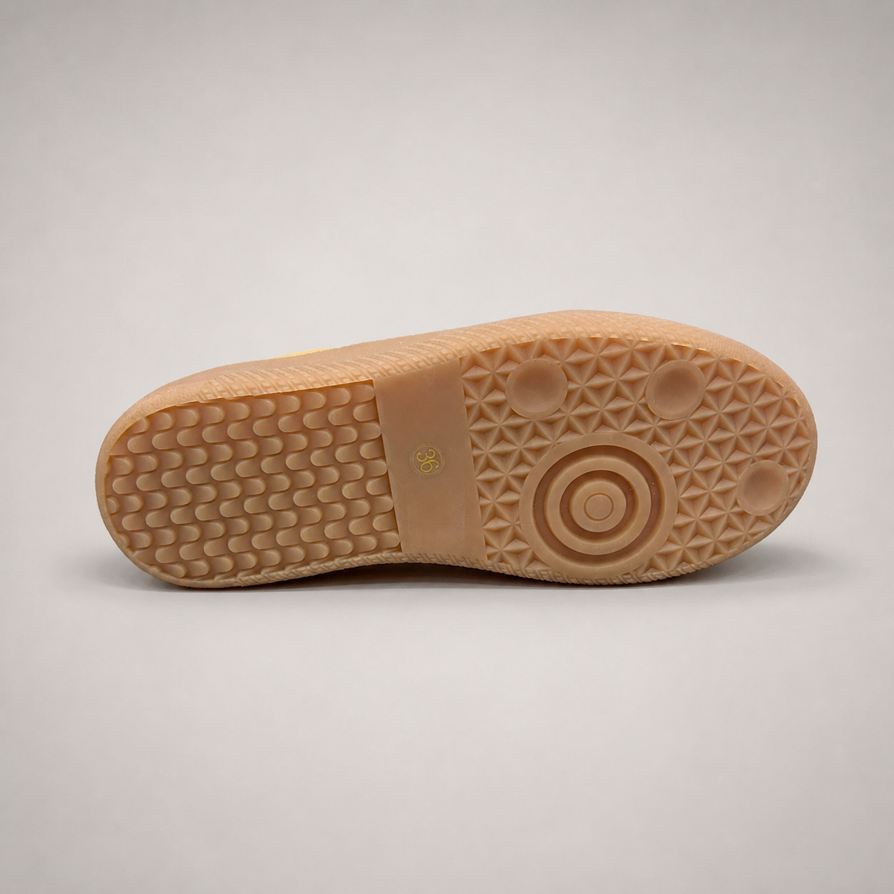 Tan platform sneaker top view showing a lace-up upper and raised platform sole