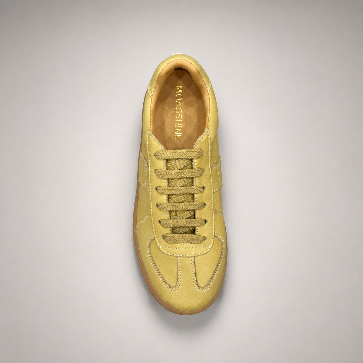 Yellow platform sneaker outsole view showing the rubber outsole