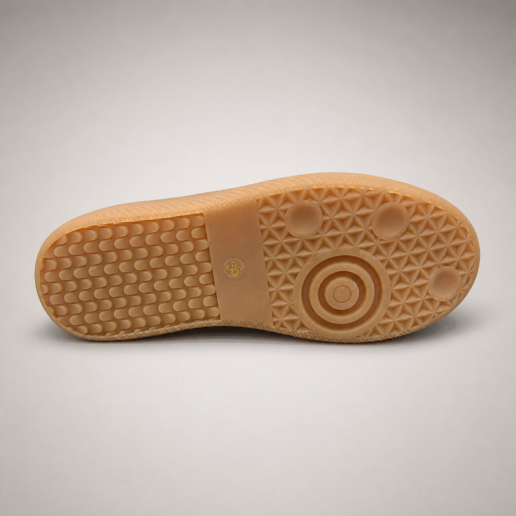 Brown platform sneaker outsole view showing the rubber outsole