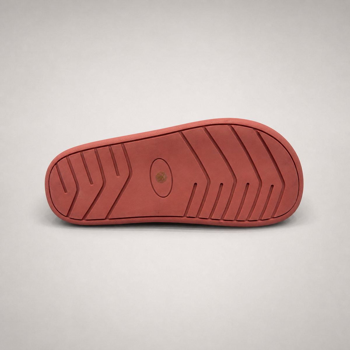 Rust low-top sneaker outsole view showing the rubber outsole