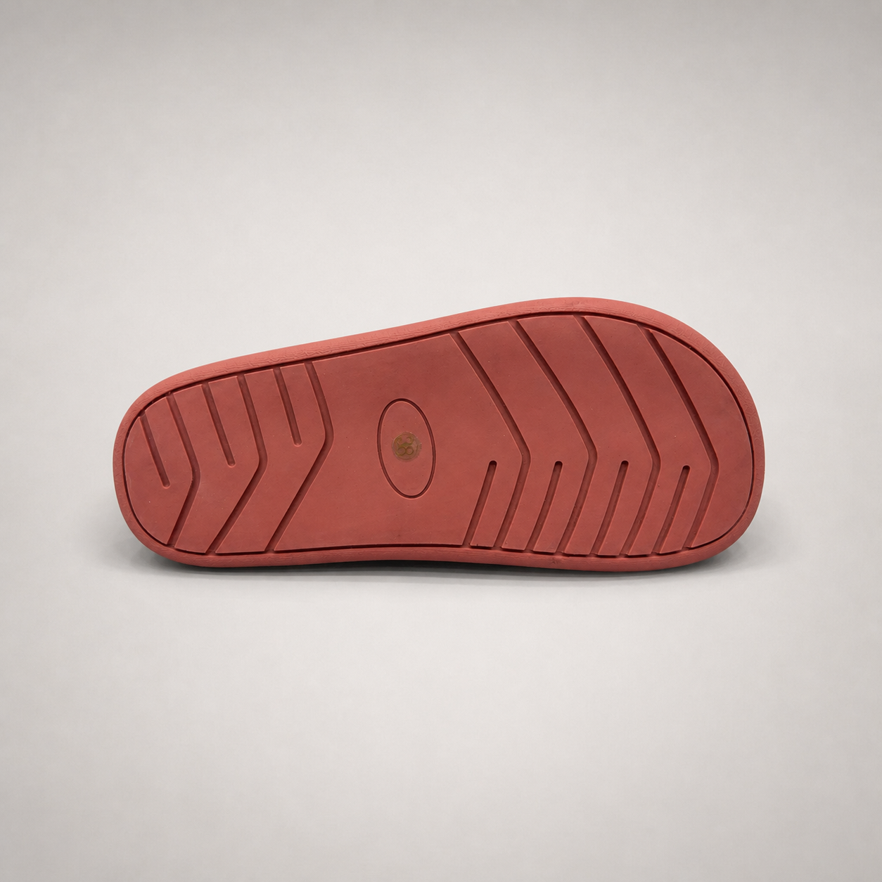 Rust low-top sneaker outsole view showing the rubber outsole
