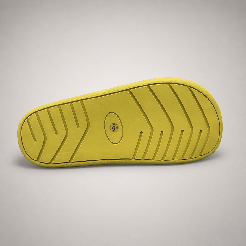 Yellow low-top sneaker top view showing a lace-up low-top construction