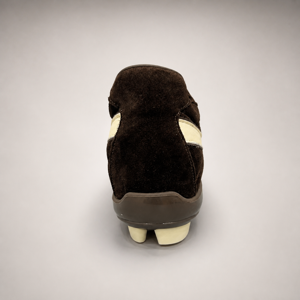 Dark Brown soccer shoe rear view showing a lace-up upper and molded outsole studs