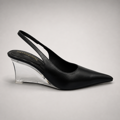Black wedge slingback pump side profile showing a pointed toe, slingback strap, and clear wedge heel
