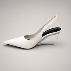 White wedge slingback pump opposite side profile showing a pointed toe, slingback strap, and clear wedge heel