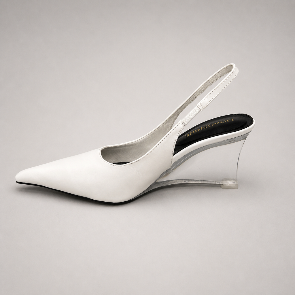 White wedge slingback pump opposite side profile showing a pointed toe, slingback strap, and clear wedge heel